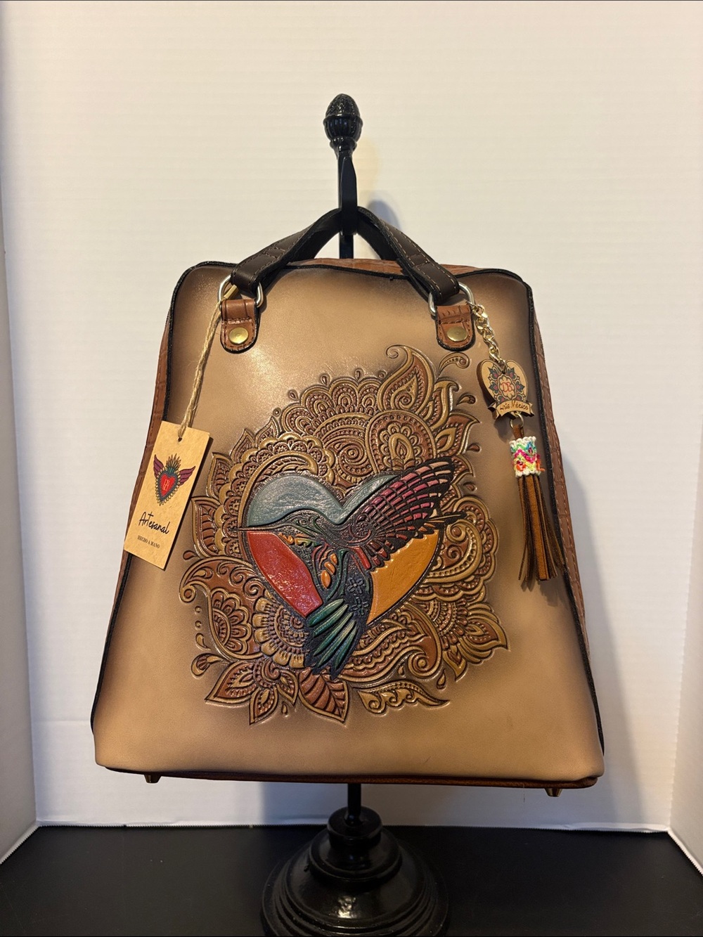Hand-Tooled Brown Leather Backpack with Colorful Hummingbird